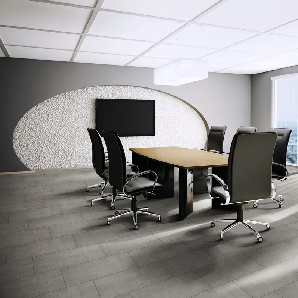 Gray concrete-look vinyl tile in corporate meeting room