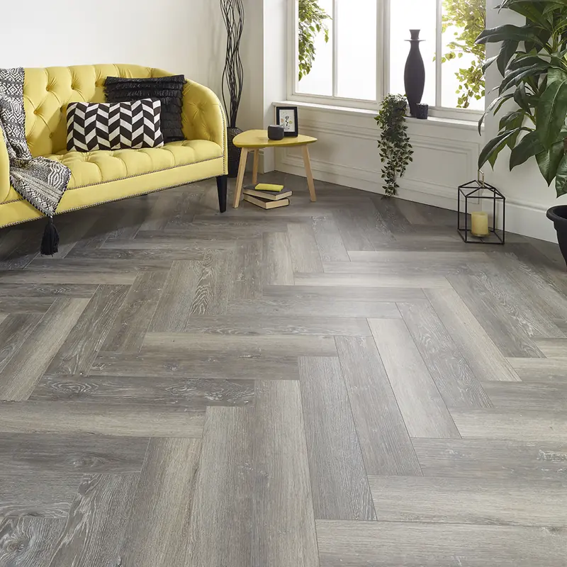Gray herringbone vinyl flooring with wood look