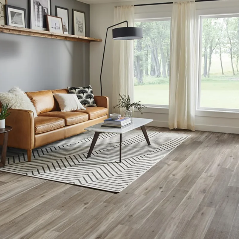 Light gray vinyl flooring with modern wood grain texture