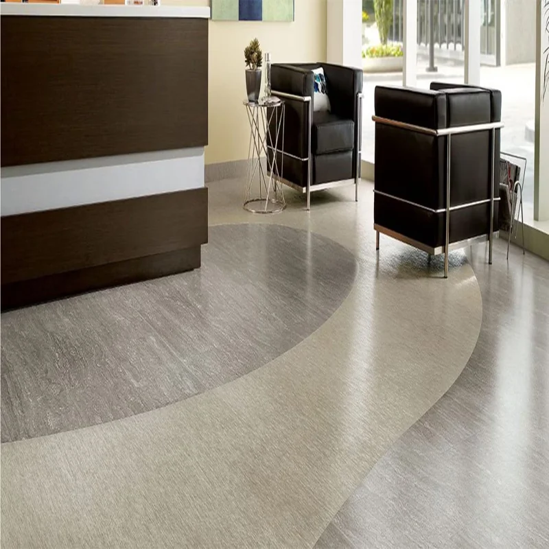 Two-tone curved vinyl flooring design in reception