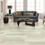 wood-look luxury vinyl plank flooring featuring a blend of white, beige, and soft gray planks